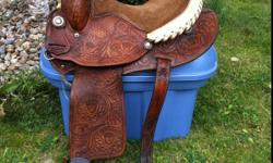 14" Martha Josey saddle in excellent shape. Well looked after. Solid horn, good fleece. Very comfortable to ride in. Fits horses with high withers. Comes w/ front and back cinch. Asking $950 obo.
Will ship free within BC. Located in Salmon Arm.
This ad