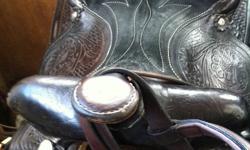 saddle not used very much u can tell by the underside, 800 obo i payed 7 the pic are from when i bought it, it still looks the same .. my horse is also for sale.