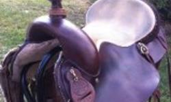15.5" Western Grand Saddlery Trail Saddle
QH bars, Dark Leather, comfortable seat. In very good shape.