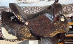 Beautiful saddle, would be a great christmas present. I got it on a trade for an english and I take a 16" seat, so this saddle is no use to me. It's a deep seat, silver lacing, has a bit of wear, but nothing a good broke in saddle doesn't have. missing