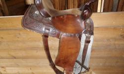 15 inch western rawhide pleasure saddle, very comfy. Great saddle. Asking $400
