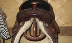 I bought this saddle for my husband at an auction but its to small for him.
His loss is your gain....$450 ...
Double TT Saddlery .... Reining Saddle
Full 1/4 bars
Give me a call if you have any questions
403-603-8185