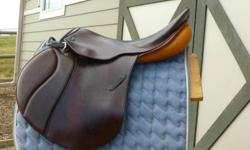English Saddle in Okotoks. Excellent condition, one owner. I am now riding western & no longer require this English saddle. Stirrup leathers like new. Includes carrying bag, stirrup leathers, irons, 2 saddle pads, removable grab strap on saddle, & Stubben