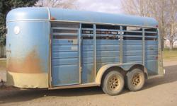 1990 15" Stock Trailer
Removable Upfront Tack, center divider.
Axles, rocker arms to the nuts and bolts have been replaced. Also comes with stabilizer hitch.