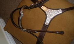 FOR SALE:
 
1) Matching headstall and breast collar with plenty of chrome.  Dark leather, nice and supple. $80.00
 
2) Rawhide and silver breast collar.  Very unique!  Mild wear - $50.00
 
3) Half chaps - brand new, size medium, black - $30.00
 
270-4380