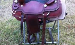 I am selling my Ted Robinson edition cutting saddle. 17" seat, very comfortable, super durable rawhide-wraped solid wood tree. This is basically one of the nicest saddles you can buy, the retail price, in the US is 3800-5000 and are endorsed by some of