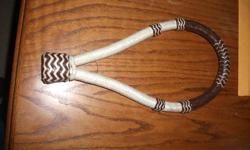 Rawhide bosal I think the brand name is showman but am not sure at all. It has been used by be a handful of times cleaned and will looked after. I would like $30 for it.
Mecate Reins 22feet I think they are nylon unsure bought them 2 years ago never used
