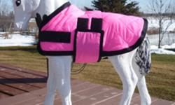 Miniature Horse Foal Blankets
 Be ready for your new foals with a nice warm blanket
I make Miniature Horse Blanket/Jackets on my spare time.
These are new and this one is shown on a small concrete horse.
(concrete horse not for sale)
Some are polar fleece