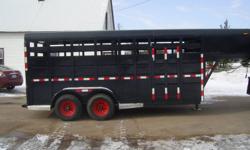 1998 Corn pro livestock trailer. 2 4500 lbs duraflex axles. Cow gate on back door. Center gate and head gate. Completely rebuilt. New paint and rock guarded. New reflective striping. Aluminum running boards. New tin halfway up each side. New tin on back