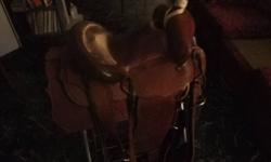 Custom built all around fancy saddle c/w  matching breast collar. On Eamor tree. 15in seat.
 
$1195.00 OBO