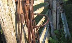 2 rolled bridles.  One cob, one full size.
Each comes with a one set of rolled reins.  One laced and one webbed.
First come gets first choice.
$75.00 each
 
Full size black bridle with copper browband.
Comes with laced reins.
$25.00
 
Lots of bits