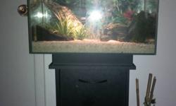 Unfortunately i'm selling my 6 gallon fluval edge tank with the stand and everything you'll need for it. It has some shrimp and some smaller tetras in it, been up and running now for over 6 months. Just no time for the tank any more my other animals take