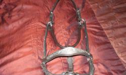 Beautiful full size dark oil show halter with silver bars  and buckles , flared silver piece on noseband, fully adjustable for that custom fitted look, in excellent shape!!A great buy at $55.00 Also have a lighter oil chain lead which is in new condition,