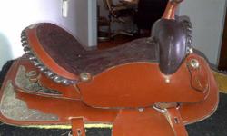 I have a beautiful Western Show Saddle with a 16" seat that I am looking to sell. I have only used the saddle a handful of times. It is a custom made saddle (though I'm not sure of the maker - I was told this when I purchased it a year ago.)
I'm asking
