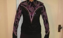 Beautiful purple,black, sequin show shirt for sale. Ladies size medium. Used in only 4 shows and is in excellent condition. New price 250.00. Excellent price for a 4-Her looking for a reasonable show shirt. Seller able to meet in Red Deer or Calgary.
