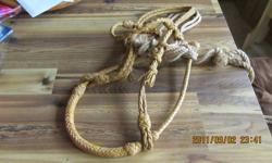 Alot of work went into this bosal and head stall. Use it, or hang it as a western decoration.