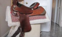 Lightwight Western Show Saddle 15" seat with matching bridle & breaststrap $700.  Other accessories available, 3 new halters, new bareback saddle pad with stirrups $70. Electric Bucket must see.  All in excellent condition. please call 519-798-3492 ask
