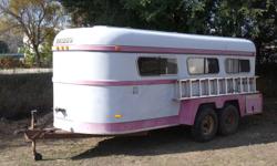 All fiberglass/gelcoat construction. Steel frame. Two full dividers with sliding walk throughs. Rubber mats on new floor. All tires new. Brakes, bearings, wiring all like new. Even the windows are new. This trailer is so light, you can pull it behind your