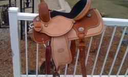 For broad QH! Bought Brand new 2 years ago!    Full Quarter Horse Bars, twisted Stirrups.  Roughed out leather! Black suede seat.  Beautiful saddle, like riding in a cadillac! Used it on my very broad Quarter Horse, with huge shoulders, other saddles her