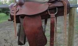 15" 'Western Rawhide' saddle. 7" gullet. Great overall condition apart from a few discoloration spots, most hidden when you're in the saddle. Solid tree, supple leather, good fleece.
 
$400 firm Comes with front and back cinch. (Similar 'Western Rawhide'