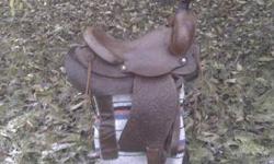 Used big horn 14" western saddle.
Very well cared for Big Horn youth/adult saddle
Well made quality saddle. Has beautiful tooling,smooth leather seat good fleece, good horn, and a wooden tree (very hard to find these days) This is not an E-bay special or