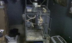 i have a bird cage that measures 18x18x19 inches. i stands 54 inches with the stand. its made out of a grey metal. it also have a play stand built into it on the top.