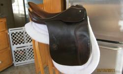 Beautiful deep brown Passier GT dressage saddle.
 Seat: 16.5" (measures 17")
 Tree:  MediumWide
Billets are sound, and don't require a short girth. Flocking is soft and smooth. Saddle is in very good condition, with only a few superficial marks from use.