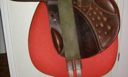 18" Military II eventing saddle in havana brown, medium tree. Saddle has been lightly used for 3 years was new when purchased. This saddle is light weight and close contact. This saddle has been flocked in the last year by Schleese Saddlery, and has only