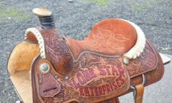 15" trophy roping saddle. Been ridden in only about 3 times, very comfy. full quarter horse bars