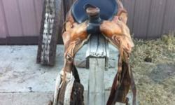 Saddle for sale. It has a new seat. It's comfortable. Used for team roping. Good condition.