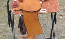 Roughout jockeys and fenders, suede seat, 5" cantle. No flank strap. Can be seen at Horse Crazy Tack, Pouce Coupe. Taxes apply. Ph. 250-786-5860.