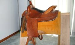 I am offering a western saddle in very good shape comfy with a little silver, and a english saddle its a 17"Argintina made cortina also in good shape believe its is a close contact. will sell together or seperate.asking 600 for both saddles.