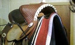 15 inch FQHB pro outfitter Barrel saddle hand crafted by gerald bethune in excellent shape serious buyers only saddle is worth a lot more than i'm asking ..