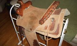 I have a 15" western saddle for sale. See pics. Good condition.
has small tear on seat at back.150.00. (Beaverton)