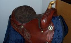 15"  BigHorn Western Saddle, excellant condition. Asking $500. Includes girth and navy quilted saddle bag to keep it in.