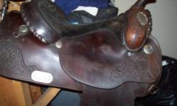 I am selling a 15" western saddle. saddle is in good condition and has some silver on it, reason for selling is that it doesn't fit my horse. FQHB