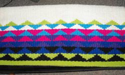 Reversible Western show saddle blanket, only used once. Paid $200.00 new. In mint condition, I'm asking $50.00